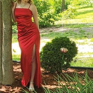 Red skin tight prom dress with slit